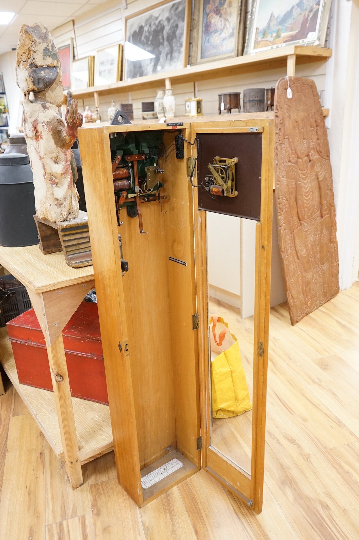 A floor standing Blick-Electric synchrome master clock, 128.5cm high x 29cm wide